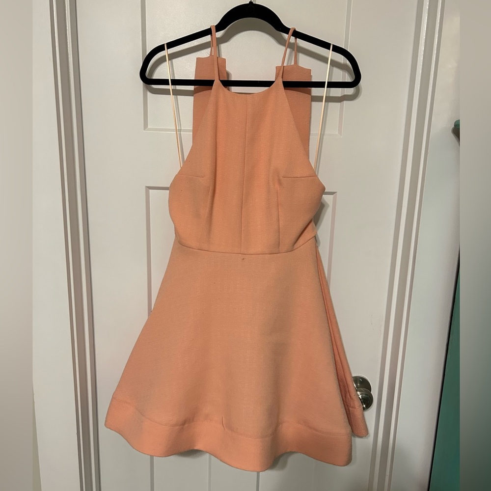 Skater dress with dramatic bow tie halter back